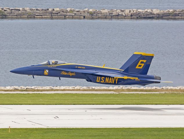 McDonnell Douglas FA-18 Hornet (16-5665) - US Navy Blue Angel #6, Opposing Solo, skimming above the runway on day one of the Cleveland National Airshow Saturday afternoon, 3 Sep 2022. 