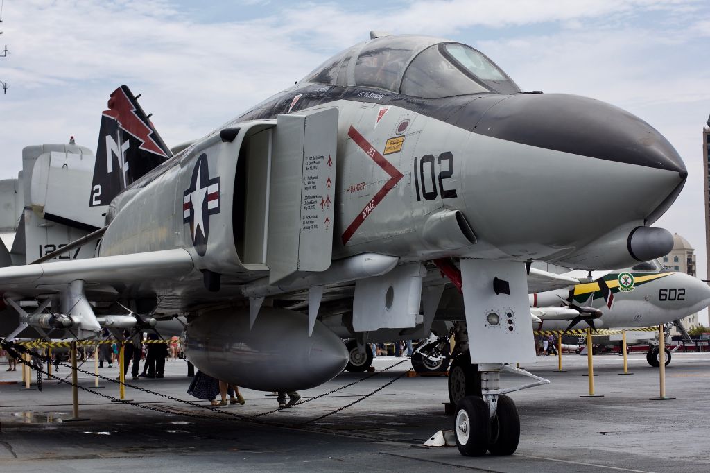 McDonnell Douglas F-4 Phantom 2 (15-3030) - This F-4N now rests aboard the USS Midway museum in San Diego. This Spook is dual painted, one side representing VF-21 which recorded two MiG kills while operating off the USS Midway in 1965 (as well as a third unconfirmed kill), the other side (pictured) VF-161 which recorded five MiG kills between 1972 and 1973. The five kill marks on the splitter plate represent the kills the squadron made, not this specific aircraft. Fantastic museum, if youre ever in SD go!