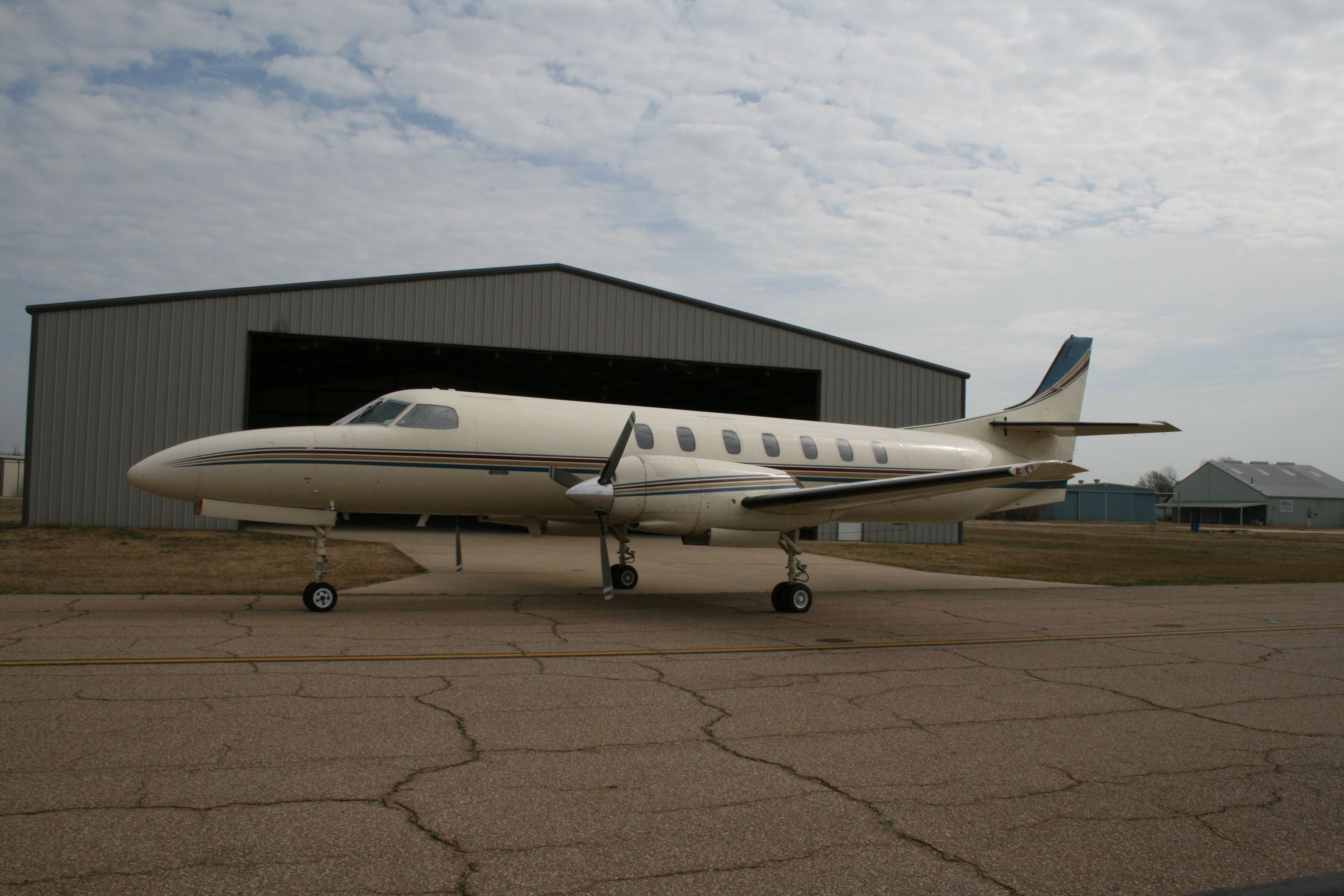 Fairchild Dornier SA-227DC Metro (N54GP) - Good Aviations Merlin IV sitting outside her home hangar.