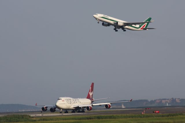 Airbus A330-200 (EI-DIP) - Alitalia off to Rome while Virgin arrives from London