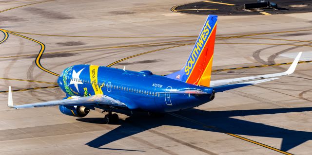 Boeing 737-700 (N727SW) - southwest Airlines 737-700 in Nevada One special livery taxiing at PHX on 10/29/22. Taken with a Canon 850D and Tamron 70-200 G2 lens.