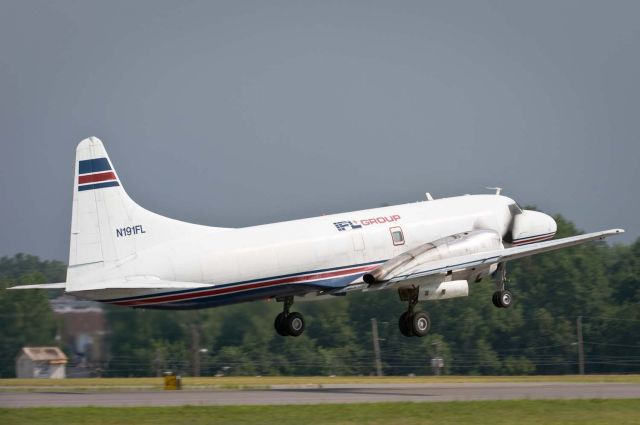 CONVAIR CV-580 (TSU191) - Departing Hickory off Rwy 24.