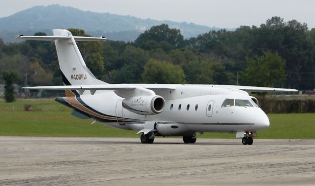 Fairchild Dornier 328JET (N406FJ) - An Ultimate Jetcharters Dornier 328-300 taxiing on the ramp at Anniston Regional Airport, AL - October 12, 2017.