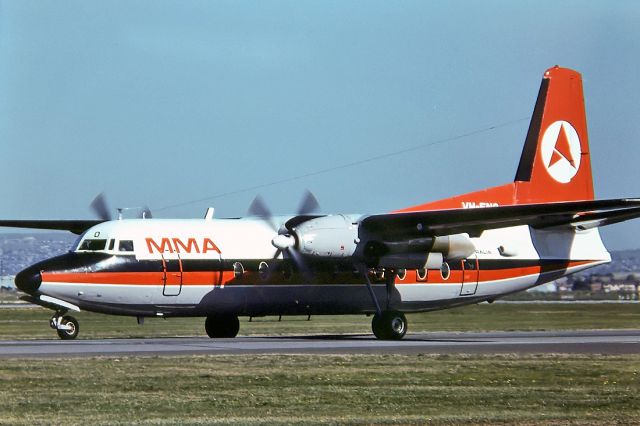 North American Trojan (VH-FNO) - ANSETT AIRLINES OF AUSTRALIA - FOKKER F27-600 FRIENDSHIP - REG : VH-FNO (CN 10304) - TULLAMARINE MELBOURNE VIC. AUSTRALIA - YMML (13/9/1976)35MM SLIDE CONVERSION USING A LIGHTBOX AND A NIKON L810 DIGITAL CAMERA IN THE MACRO MODE