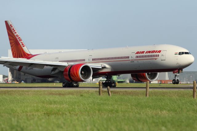 Boeing 777-200 — - Air India B777-300ER touching down on runway 027R at LHR.