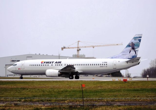 BOEING 737-400 (C-FFNC) - Departing on rwy 25 for Iqaluit (CYFB), on 11-Nov-13.