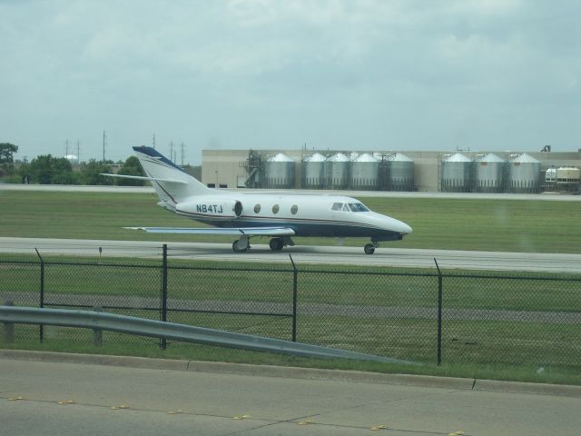 Dassault Falcon 10 (N84TJ) - Taxi for takeoff rwy 15 at KADS.