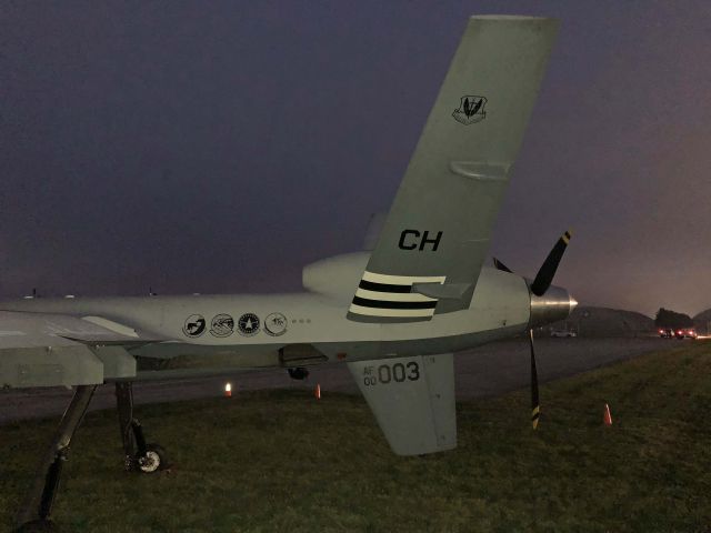 General Atomics Reaper (02-4003) - A General Atomics Aeronautical Systems Inc MQ-9 Reaper, the featured Aircraft for the 2018 United States Air Force Marathon, on display before the opening ceremonies at the National Museum of the United States Air Force/Wright-Patterson Air Force Base on 15 Sep 2018. MQ-9, 02-4003, c/n PB-003, was brought in from Creech Air Force Base, NV for the festivities. My wife and I participated in the 5K (14 Sep 2018) and 10K (15 Sep 2018) portions.