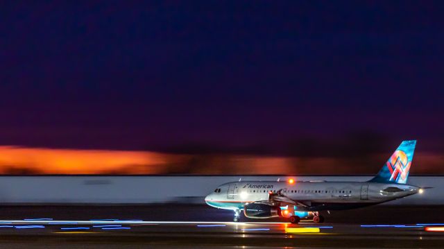 Airbus A319 (N838AW) - American A319 departing KGRR on 08R a cold January morning