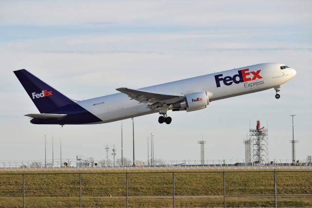 BOEING 767-300 (N177FE) - 23-L Departure on 11-19-20 during golden hour.