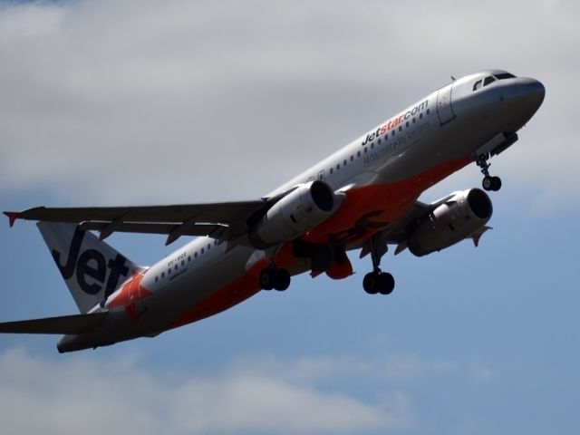 Airbus A320 (VH-VQX) - On taxi-way heading for Terminal 1, after landing on runway 23.