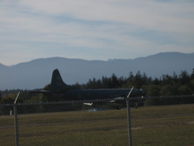 — — - "Touch-down"   Canadian Forces Aurora Survailance aircraft  CFB Comox