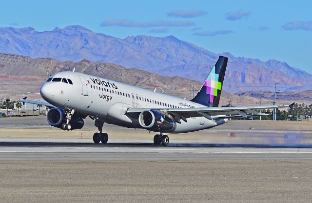 Airbus A320 (N513VL) - N513VL Volaris 2012 Airbus A320-233 - cn 5322 "Jorge" - McCarran International Airport, Las Vegas - December 4, 2013br /TDelCoro