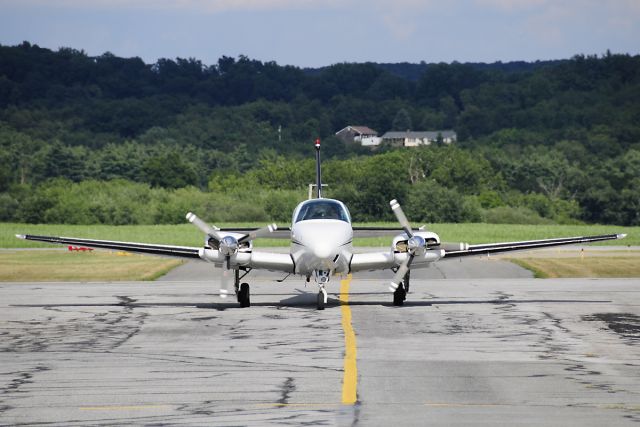 Beechcraft Baron (58) (N3828X) - Seen at KFDK on 7/19/2009.