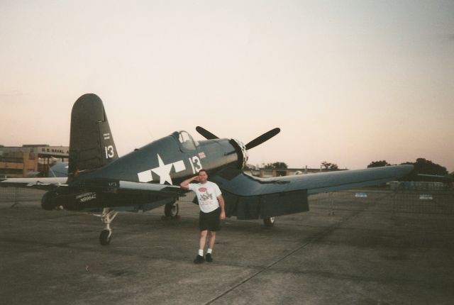 — — - Thats me leaning on the Corsair at the Navy Base. Were just hangin out. Thats our Naval Reserve Hangar in the back ground. Hey, wheres Pappy Boyington? his planes ready. Oct. 1998.