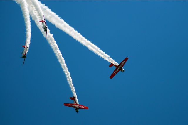 — — - The Aeroshell Aerobatic Team