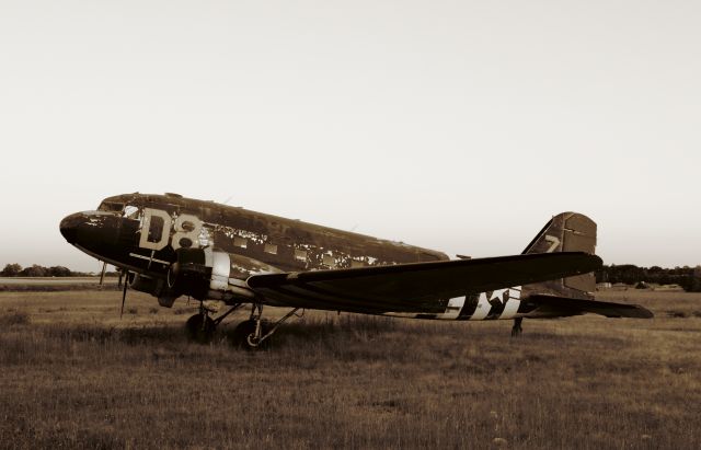 Douglas DC-3 (N12907) - A sepia study of a derelict DC-3. Open in "full." tgoedeke@vnet.net