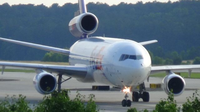 McDonnell Douglas DC-10 (N385FE) - FedEx 765 arriving from Memphis at 6;56 P.M.   Taken June 7, 2015.