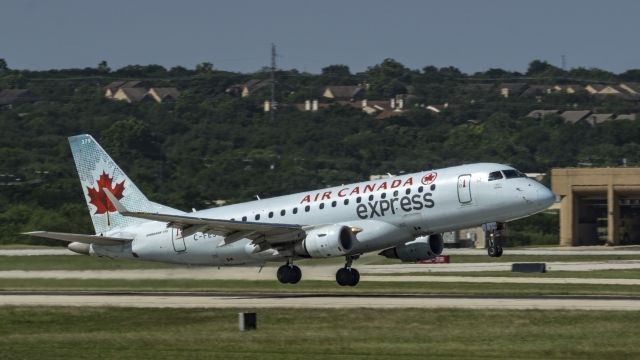 Embraer 170/175 (C-FEJY) - Departing 13R