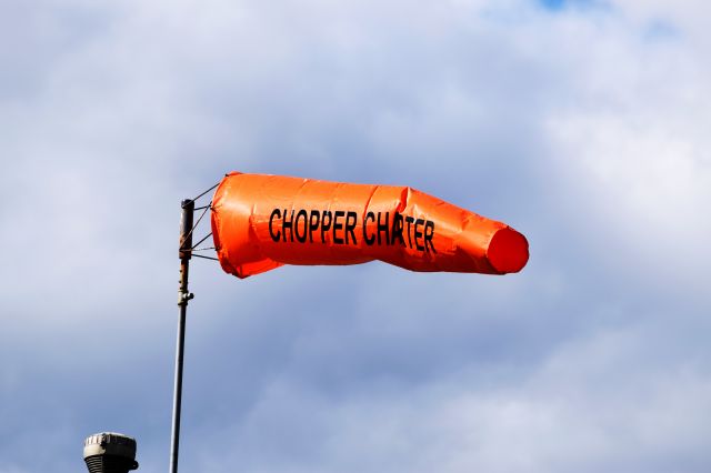 — — - Chopper Charter wind sock