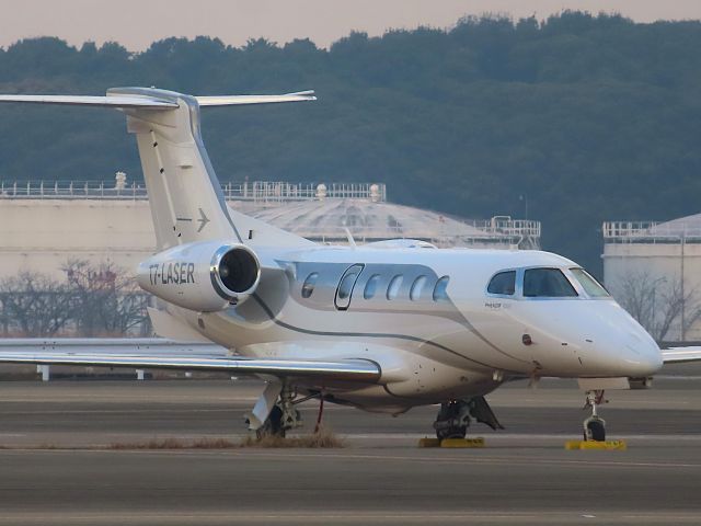 Embraer Phenom 300 (T7-LASER) - Photo taken on Dec 30, 2023.