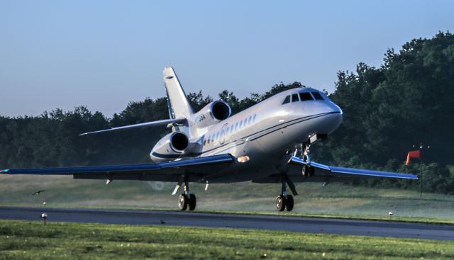 Dassault Falcon 900 (N919SA) - TAKEOFF 6-23-13  Notice the Vortex off the left side of the aircraft