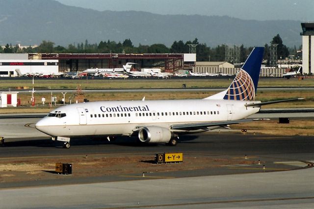 BOEING 737-300 — - KSJC - Continental 737 taxis to 30L at San Jose nose wheel 321