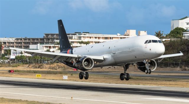 Airbus A321 (G-NIKO) - Titan Airways landing at St maarten.