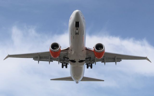 Boeing 737 MAX 8 (C-FMXA) - Sunwing overhead, on final for Montreal. Took this shot in July of last year. Hoping the MAX flies again soon.