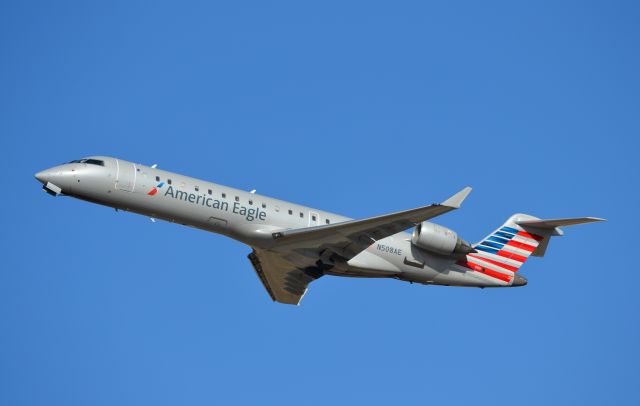 Canadair Regional Jet CRJ-700 (N508AE) - West end of rwy 7/25 by Conaco Gas station.