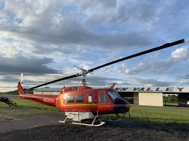 Bell UH-1V Iroquois (N638HA) - A helicopter casually sitting on a gravel pad overnight at Penn Valley.