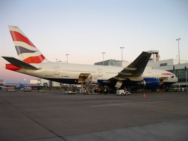 Boeing 777-200 (G-YMMT) - Parked at the international gate on A concourse at DIA.