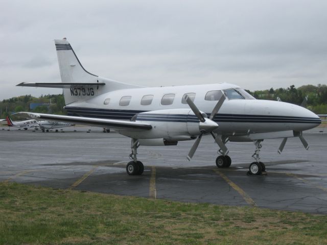 Swearingen Merlin 3 (N379JG) - Sitting on the ramp after a downpour. Arrived yesterday from Akron, OH (KCAK).