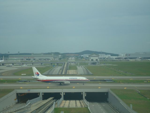 BOEING 737-400 (9M-MMF) - TAKEN FROM THE KLIA VIEWING GALLERY.