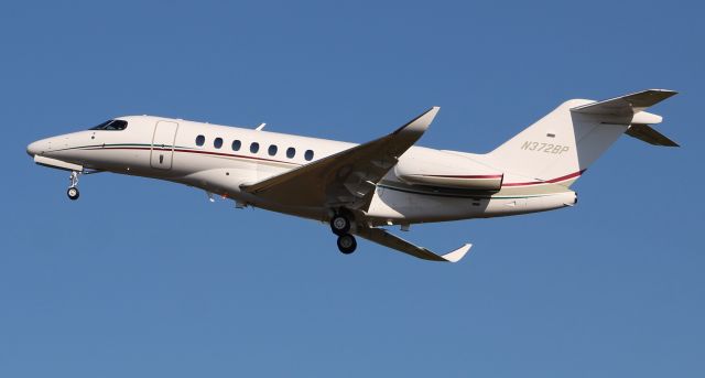 Cessna Citation Longitude (N372BP) - A Textron Aviation (Cessna) 700 Citation Longitude departing Boswell Field, Talladega Municipal Airport, AL, following the NASCAR GEICO 500 race - late afternoon, April 25, 2021.