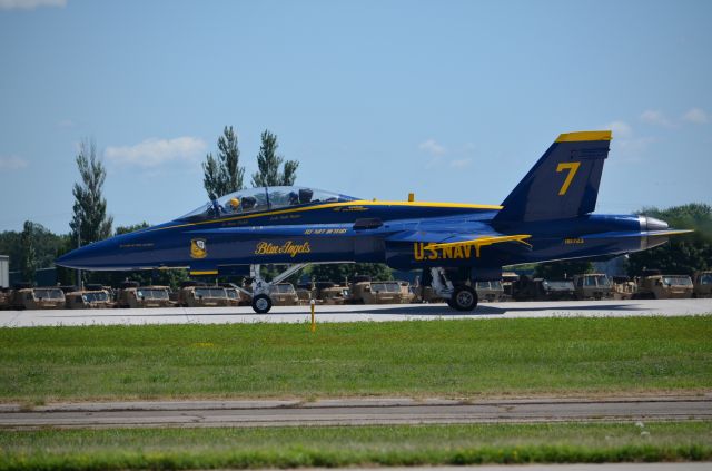 McDonnell Douglas FA-18 Hornet — - EAA 2011 Blue Angels F-18 taxiing, taking some lucky fellow for a ride.