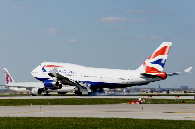 Boeing 747-400 (G-BNLK) - G-BNLK smokes up on 28C after her arrival from London-Heathrow.