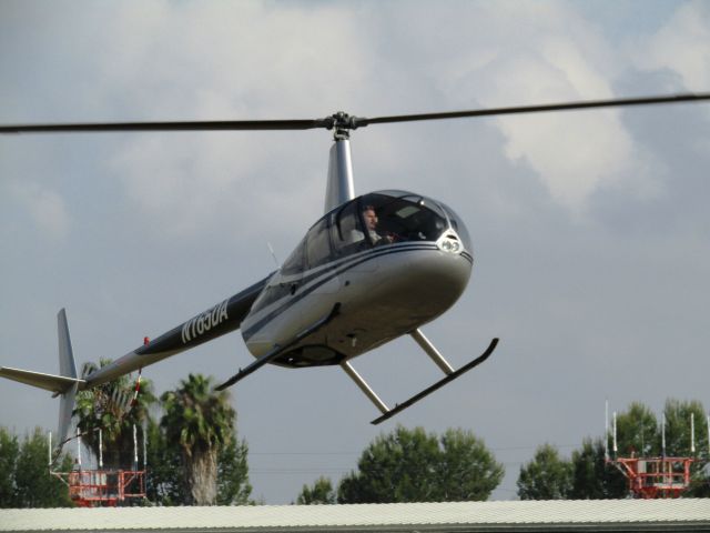 Robinson R-44 (N165DA) - Robinson R-44 chopper air-taxiing to ride area during Fullerton Airport Day 5.13.2017