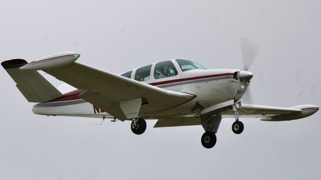 Beechcraft 35 Bonanza (N9MC) - One of the local Bonanza’s on short final for 36. br /br /N9MC. 1963 Beechcraft P35 Bonanza. Private. KVPZ. 6/11/23. 