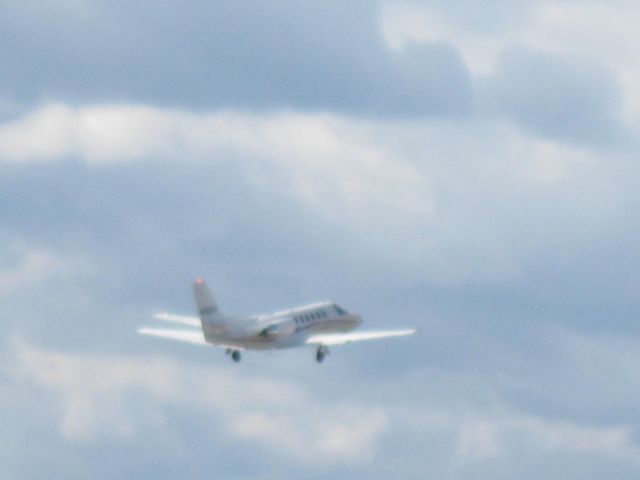 Cessna Citation V (N102KP) - After a takeoff roll of about 2100 ft., this Citation Encore takes to the breezy skies on its way to Harrisburg, PA (KCXY).