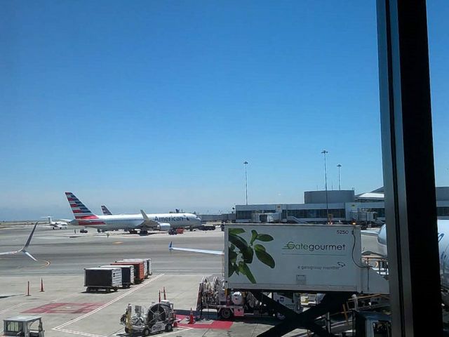 — — - KSFO walking to the gate