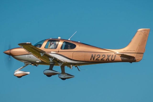 Cirrus SR-22 (N22XU) - A Cirrus SR-22 taking of from Wings Field (KLOM) during a bright clear day.