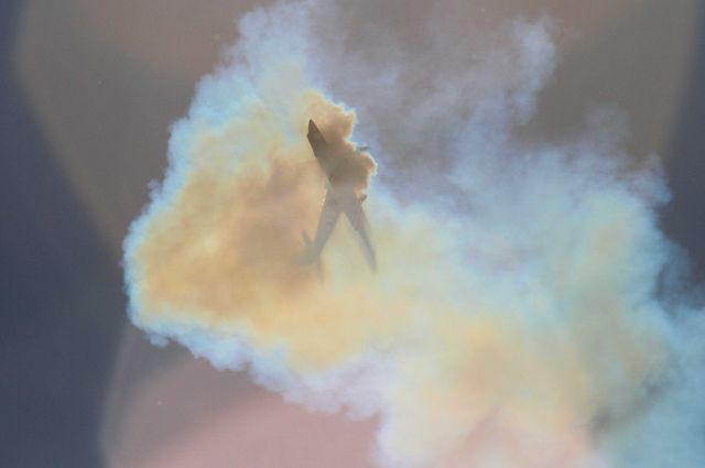 VH-YRO — - Immersed in his own smoke during airshow routine - I enjoyed the effect of the sun behind the plane and smoke and the shadows it createdbr /Watts bridge airshow August 2016