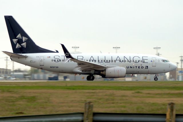 Boeing 737-700 (N13720) - 22 departure.