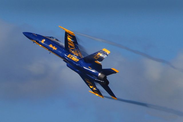 — — - Blue Angel 6 in right bank off solo 5 during performance at the California Air Show Salinas, CA.