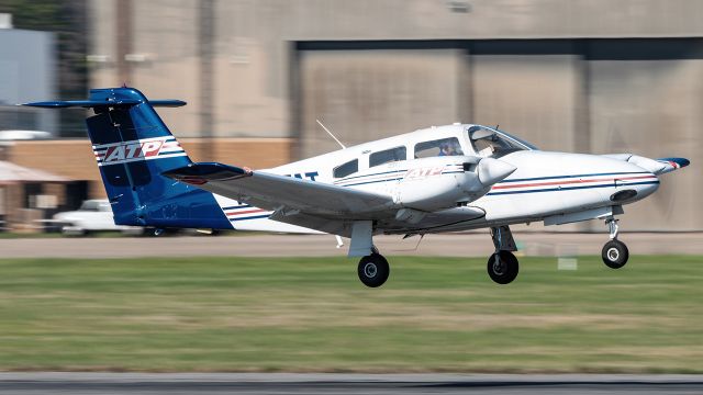 Piper PA-44 Seminole (N257AT) - N257AT floating over Martin State Airport's runway 15 while doing pattern work 