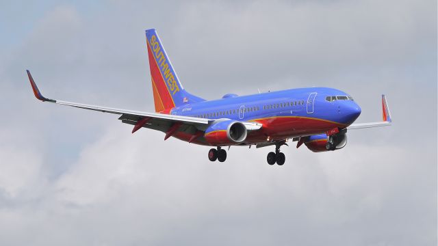 Boeing 737-700 (N7744A) - SWA8751 on final to Rwy 16R to complete a flight test on 8.23.13. The aircraft was formerly AirTrans #N318AT. (LN:2214 cn 33931).