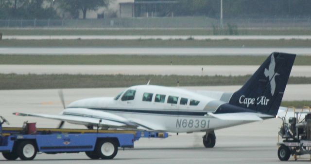 Cessna 402 (N68391) - CapeAir Starting up on the ramp at RSW on 02/11/2011