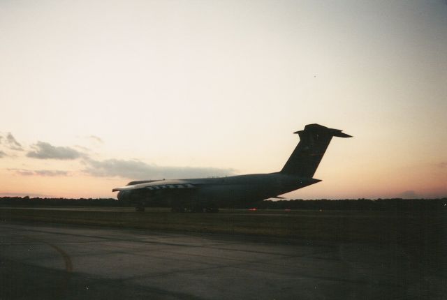 — — - Thats the C-5 taxing by at NAS New Orleans. cool picture.