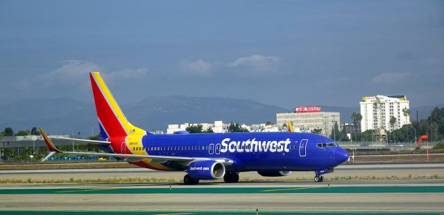 Boeing 737-800 (N8644C) - A 2014 Southwest Airlines Boeing 737-800 (737-8H4) taxiing at Los Angeles International Airport on September 12th, 2022.